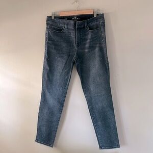 WHBM skinny ankle jeans, size 10. Dark wash with stud details on front legs